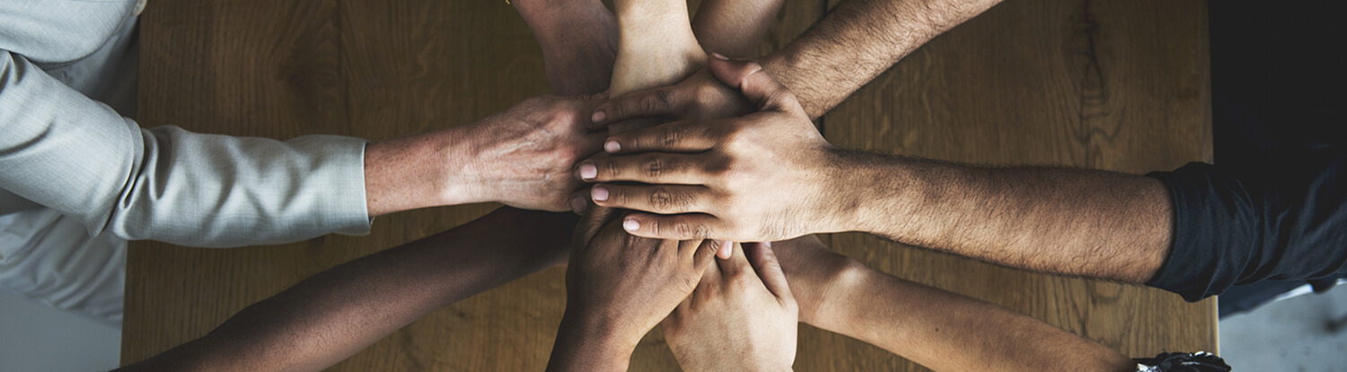 multiple hands over each other banner